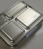 Closed Kaally Bento 4+ stainless steel lunchbox shown at an angle with the Kaally logo on the lid