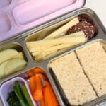 Stainless steel bento lunch box packed with fresh food