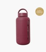 Kaally Glass Sports Bottle in Mulberry with the Clean + Conscious Awards 2026 Gold Winner rosette, Best Reusable Bottle / Cup