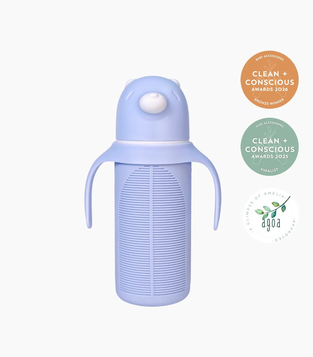 KaakaaBaby Glass Bottle 270mL Blue — Bronze, Clean + Conscious Awards 2026 KaakaaBaby glass bottle 270mL in Blue with the Clean + Conscious Awards 2026 Bronze Winner rosette, Best Baby Accessories, the 2025 Finalist rosette and the AGOA Approved mark, in a vertical column