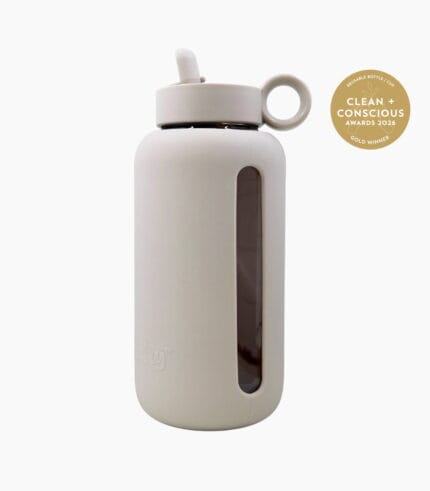 Kaally Glass Bottle 800mL in Almond with the Clean + Conscious Awards 2026 Gold Winner rosette, Best Reusable Bottle / Cup