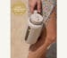 Kaally Glass Bottle in Almond with the Gold rosette — Best Reusable Bottle / Cup, Clean + Conscious Awards 2026